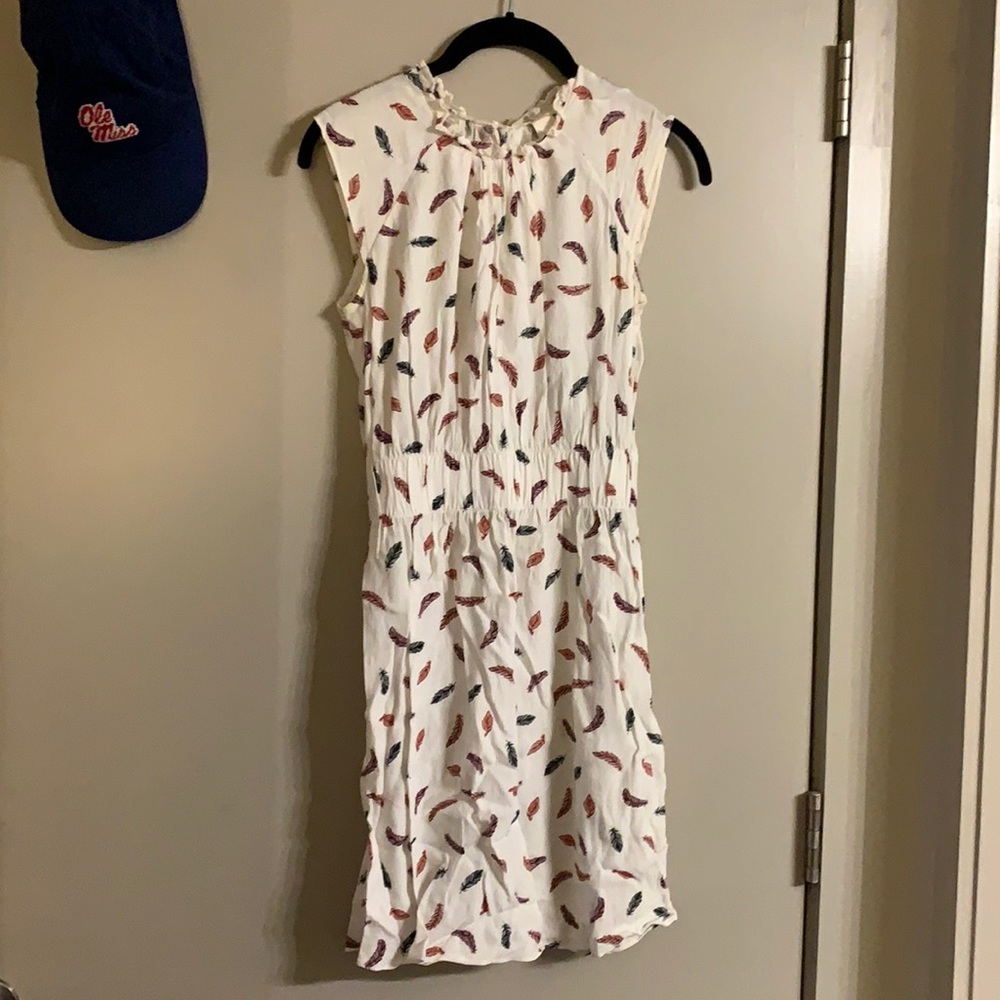 White dress with feather pattern